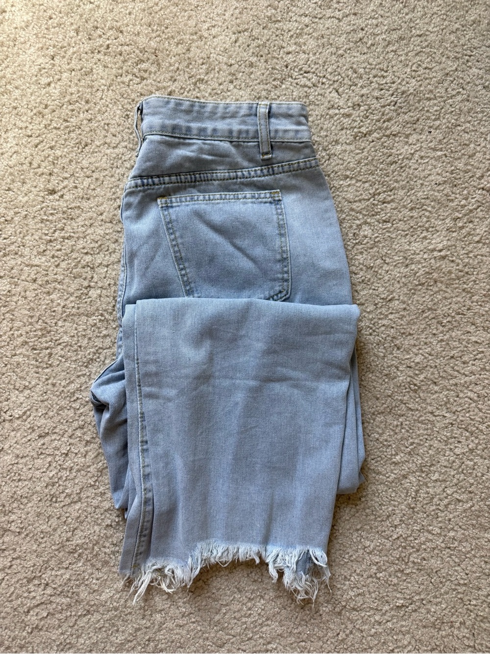 Light Blue Straight-Leg Jeans with Frayed Hem